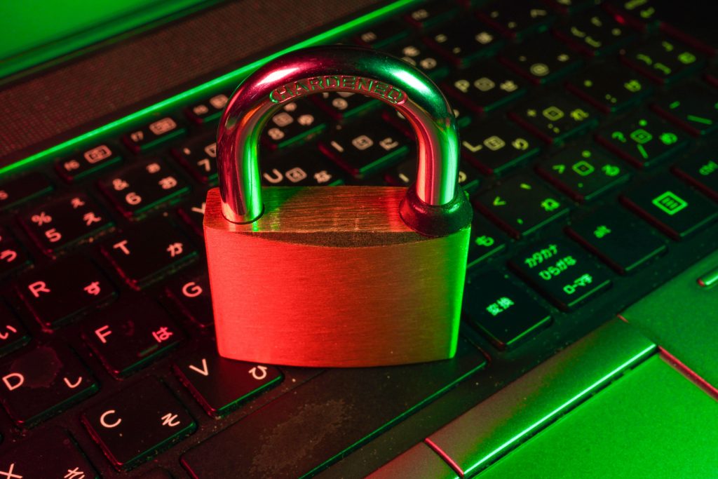 Padlock sitting on a laptop keyboard